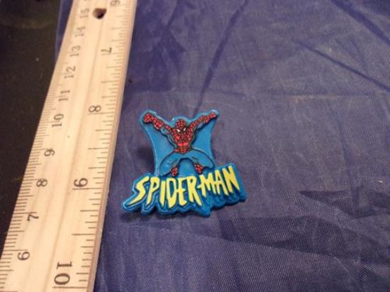 Picture of 1994 toybiz spiderman web shooter pin