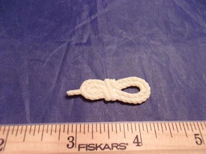 Picture of vintage clue board game rope piece