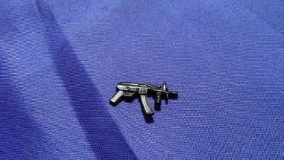 Picture of dc universe crisis gotham city swat gun