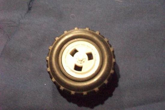 Picture of 1985 snowcat wheel with hubcap