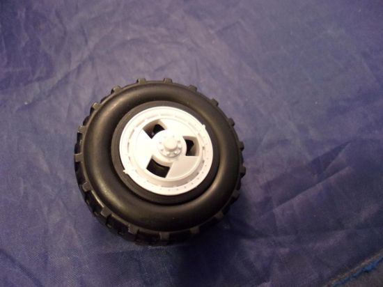 Picture of 1985 snowcat wheel with hubcap